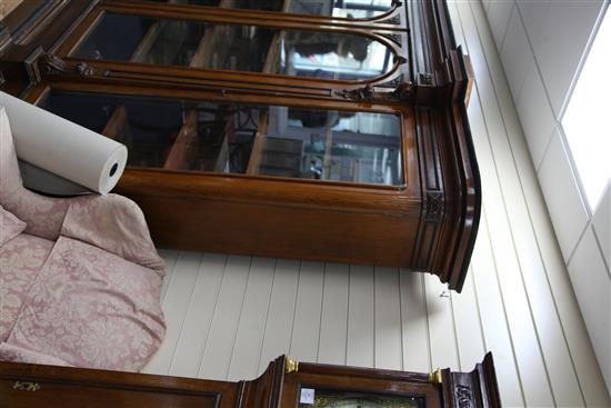 A Victorian ebony banded oak breakfront library bookcase, W.10ft D.1ft 9in. H.7ft 3in.